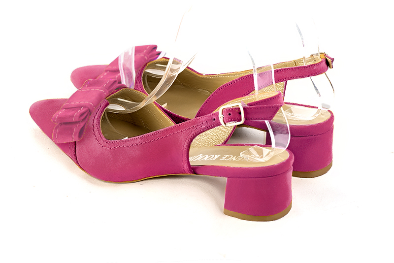 Fuschia pink women's open back shoes, with a knot. Tapered toe. Low flare heels. Rear view - Florence KOOIJMAN